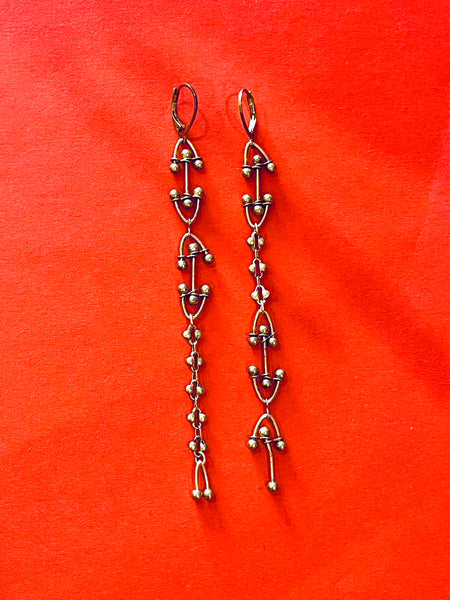 Boucles Calder asymétriques
